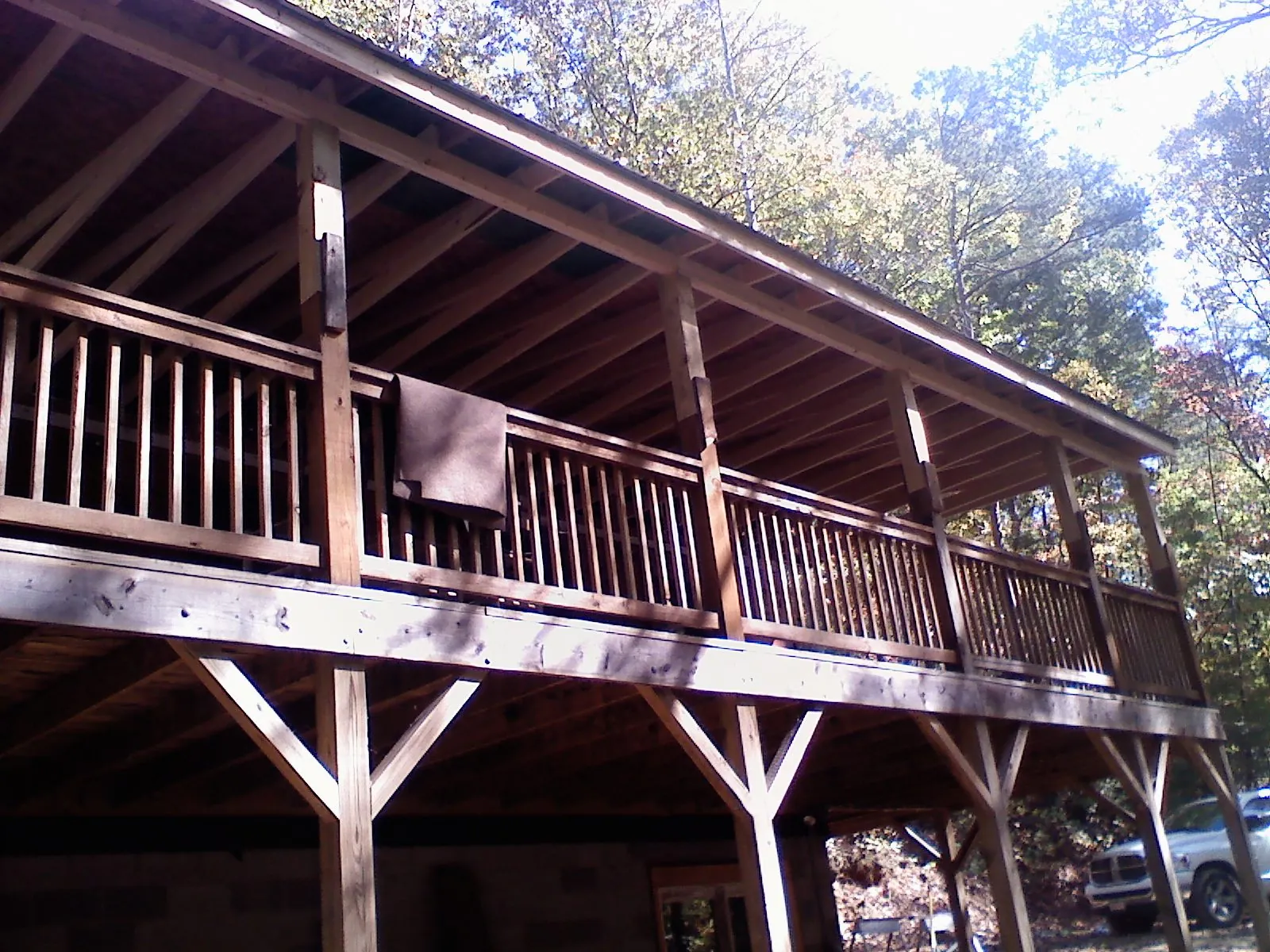 Timber framing under a new elevated porch and deck — Roof Leak Repair in Fate by Roofing Brothers